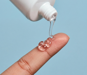 HelloBlue Lube Blue Background Gel on Finger_